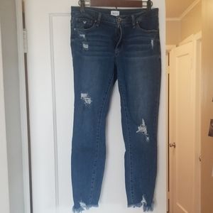 Destroyed Medium/Light wash, mid rise jean